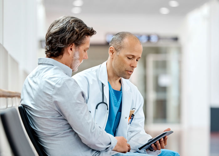 doctor with patient Atlanta Oral & Facial Surgery