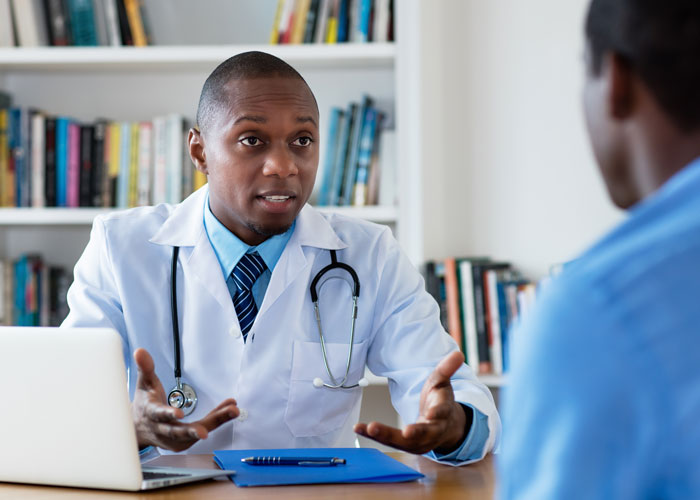 doctor with patient Atlanta Oral & Facial Surgery