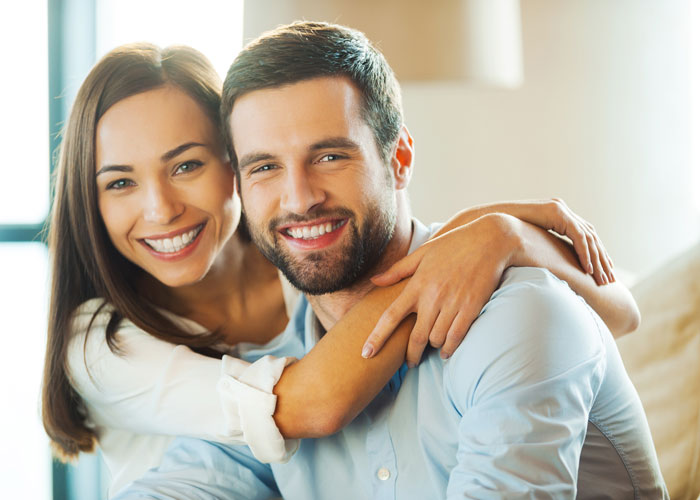 smiling young couple Atlanta Oral & Facial Surgery