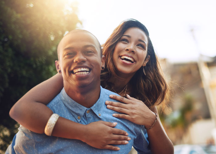 Young couple laughing and enjoying each others company