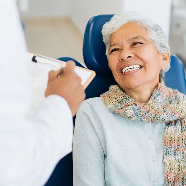 Patient seated in a medical chair during consultation for facial trauma treatment in Atlanta, GA