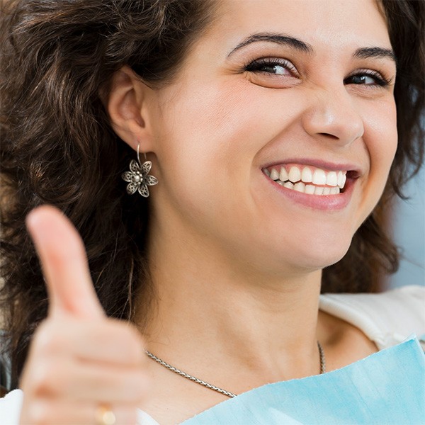 happy-woman-giving-thumbs-up