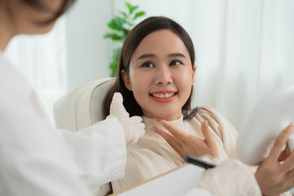 Happy patient in surgeon’s office
