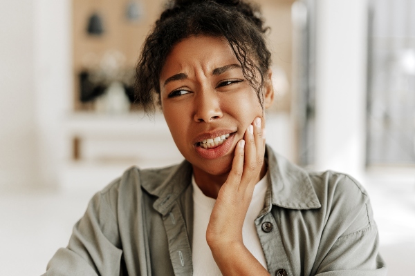 Woman in pain from tooth infection